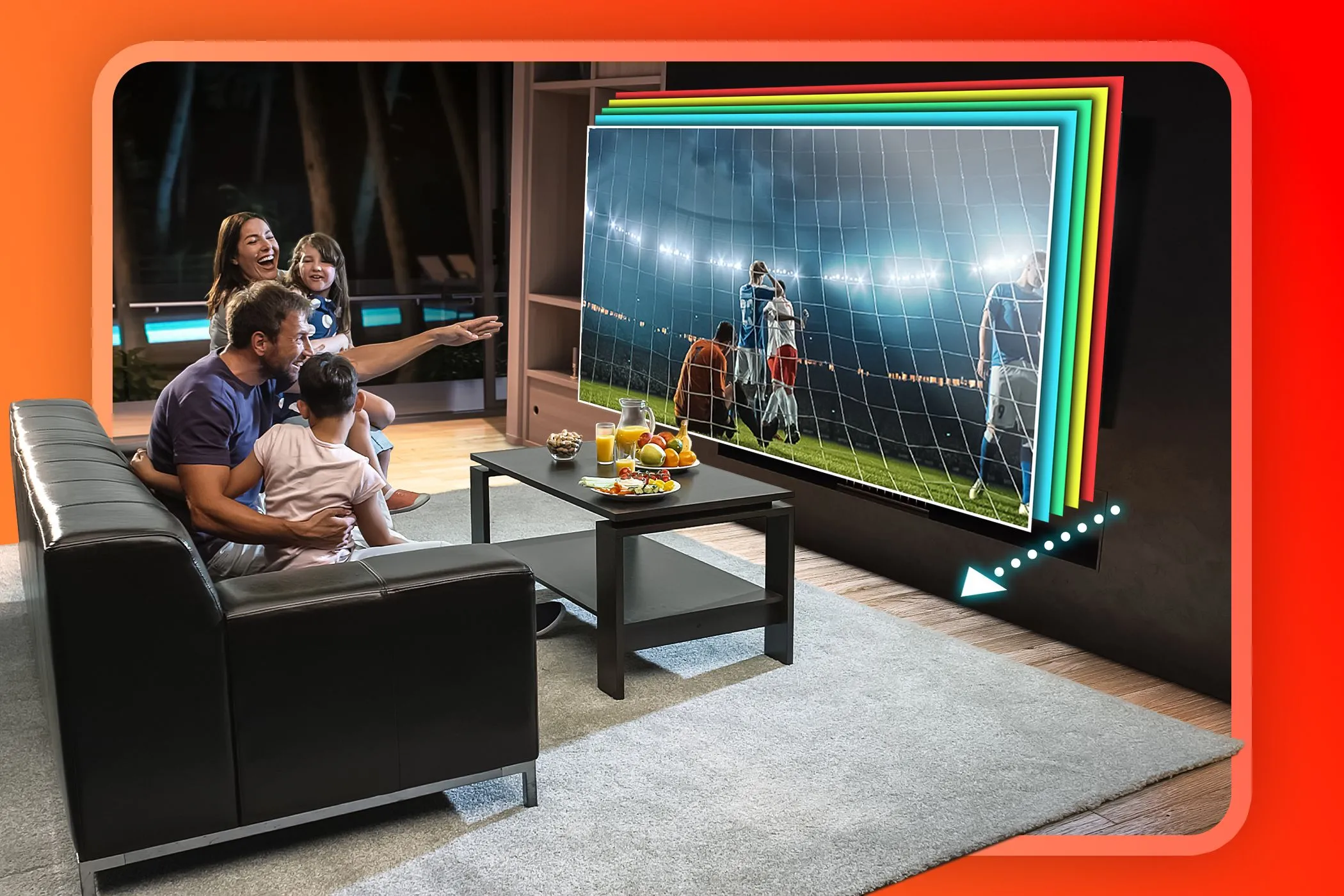 Gia đình đang xem TV trên ghế sofa, màn hình TV hiển thị cảnh chuyển động mượt mà nhờ tần số quét cao