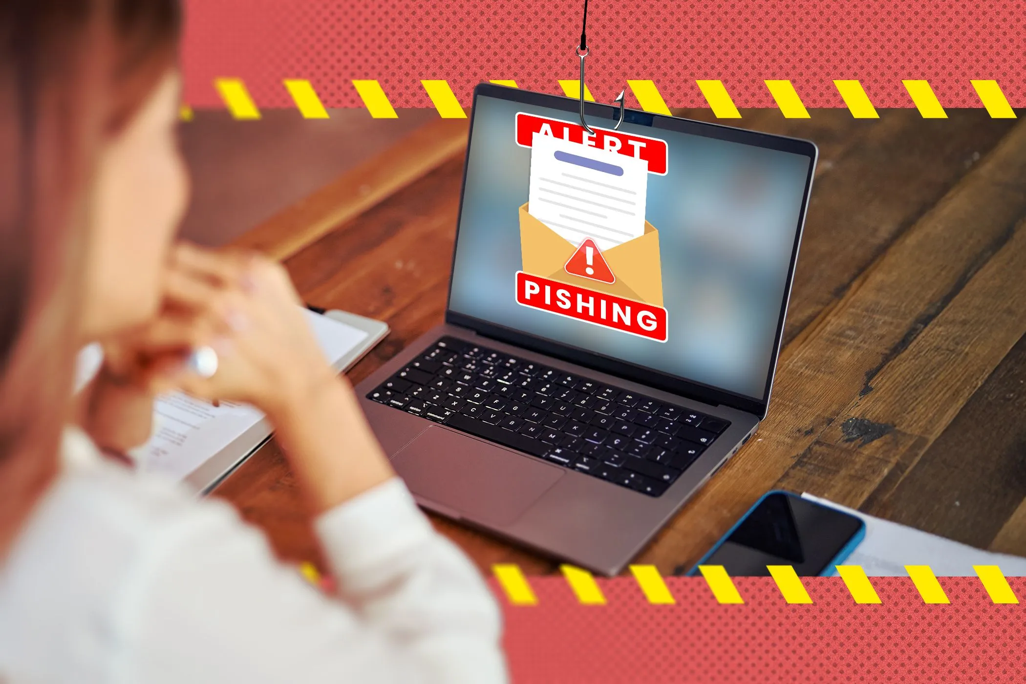 Một người phụ nữ đang sử dụng máy tính xách tay với màn hình hiển thị email lừa đảo (phishing), minh họa nguy cơ của các cuộc tấn công phishing được tăng cường bởi AI.